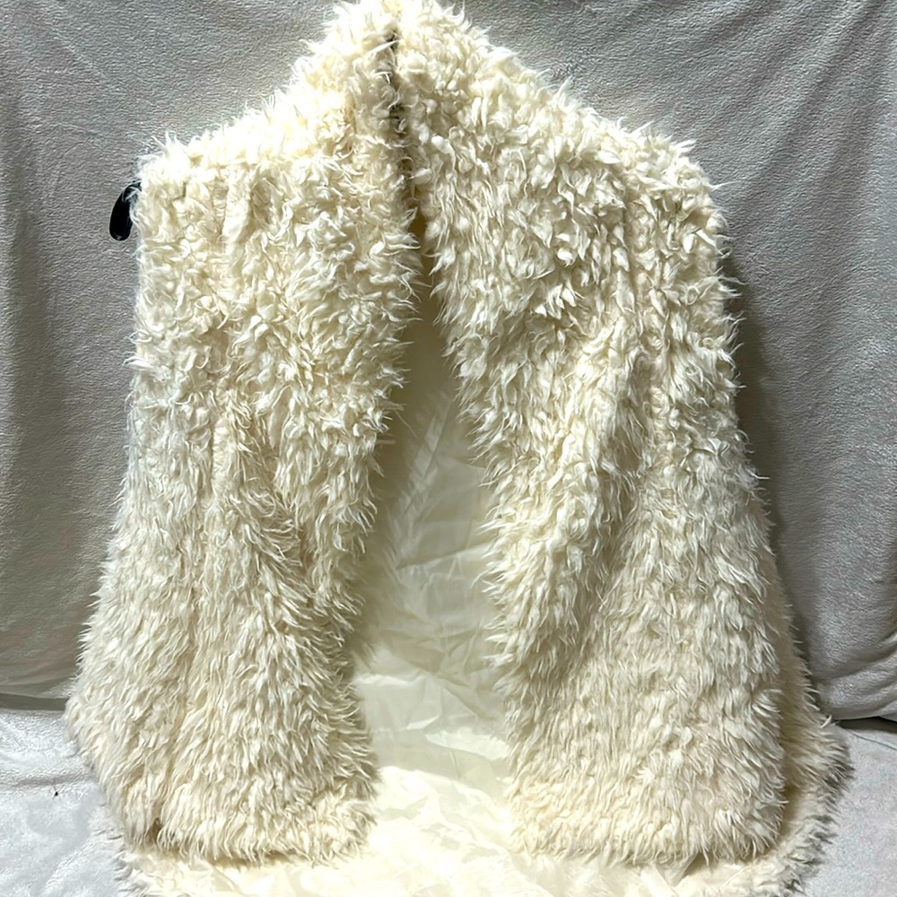 Very soft cream vest